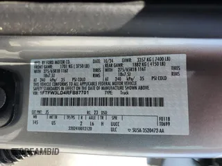2024 Ford F-150 XLT with VIN 1FTFW3LD4RFB87701, listed as a Copart auction lot 48955865 with 1,203 mi miles and Salvage Title. Bid and sale history available at carsss.com. Image 12.