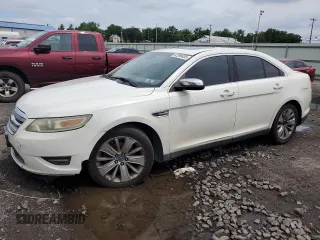 2010 Ford Taurus Limited with VIN 1FAHP2FW7AG127476, listed as a Copart auction lot 62399455 with 140,761 mi miles and Salvage title. Bid and sale history available at DreamBid. Image 1.