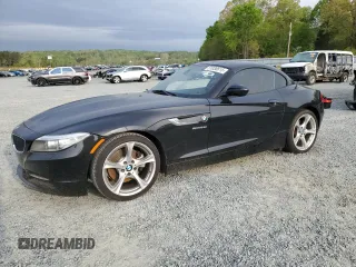 2016 BMW Z4 sDrive28i with VIN WBALL5C50GP557837, listed as a Copart auction lot 51038615 with 59,878 mi miles and Salvage Title. Bid and sale history available at carsss.com. Image 1.