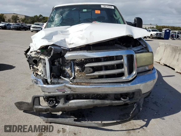 2004 Ford F-250 XL with VIN 1FTNX20PX4EA22882, listed as a Copart auction lot 79014334 with 262,447 mi miles and Salvage title. Bid and sale history available at DreamBid. Image 5.