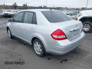 2007 Nissan Versa 1.8 SL with VIN 3N1BC11E97L447829, listed as a IAAI auction lot 41612386 with 123,500 mi miles. Bid and sale history available at carsss.com. Image 3.