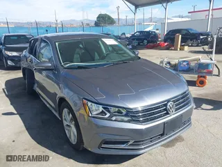 2018 Volkswagen Passat 2.0T SE with VIN 1VWBA7A33JC033434, listed as a IAAI auction lot 41616084 with 54,135 mi miles. Bid and sale history available at carsss.com. Image 1.