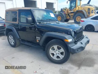 2019 Jeep Wrangler Sport S z VIN 1C4GJXAG4KW561026, wystawiony jako IAAI lot #41640018 z przebiegiem 54 427 mil mil oraz . Historia ofert i sprzedaży dostępna na DreamBid. Obrazek 1.