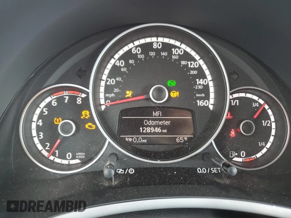 2015 Volkswagen Beetle 1.8T with VIN 3VW517AT6FM802771, listed as a Copart auction lot 72225834 with 128,946 mi miles and Salvage title. Bid and sale history available at DreamBid. Image 9.