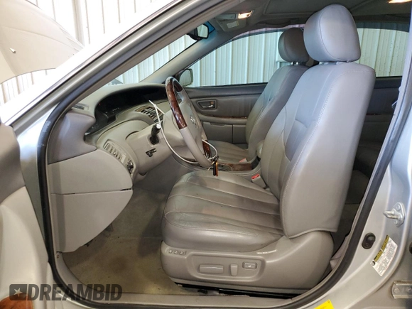 2004 Toyota Avalon XL with VIN 4T1BF28B34U383872, listed as a Copart auction lot 54830445 with 205,463 mi miles and Salvage Title. Bid and sale history available at carsss.com. Image 7.