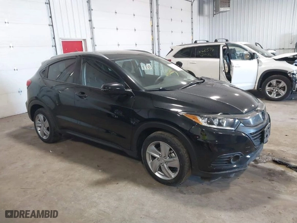 2020 Honda HR-V EX with VIN 3CZRU6H59LM737305, listed as a IAAI auction lot 41679197 with 76,670 mi miles. Bid and sale history available at carsss.com. Image 1.