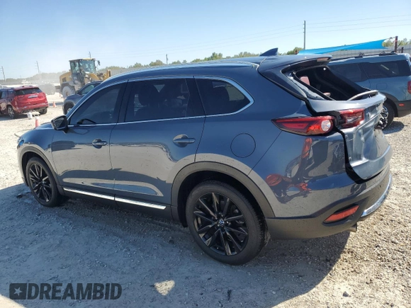 2023 Mazda CX-9 Carbon Edition with VIN JM3TCBDY8P0653953, listed as a Copart auction lot 48810905 with 27,677 mi miles and Salvage title. Bid and sale history available at DreamBid. Image 2.
