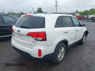 2015 Kia Sorento LX with VIN 5XYKTCA63FG586054, listed as a IAAI auction lot 42246543 with 159,427 mi miles and . Bid and sale history available at DreamBid. Image 4.
