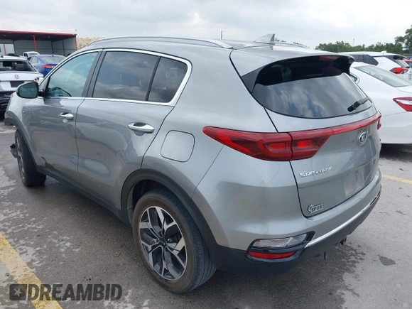 2020 Kia Sportage EX with VIN KNDPNCAC2L7791248, listed as a IAAI auction lot 42104819 with 73,324 mi miles and . Bid and sale history available at DreamBid. Image 3.