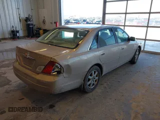 2002 Toyota Avalon XL with VIN 4T1BF28B32U255693, listed as a IAAI auction lot 41629186 with 221,335 mi miles and . Bid and sale history available at DreamBid. Image 4.
