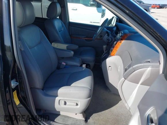 2009 Toyota Sienna XLE with VIN 5TDZK22C59S235573, listed as a IAAI auction lot 40885143 with 62,949 mi miles. Bid and sale history available at carsss.com. Image 5.