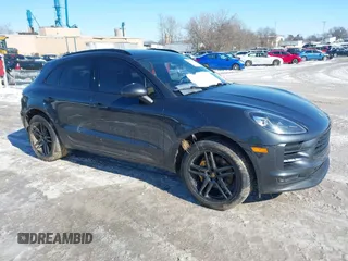 2021 Porsche Macan z VIN WP1AA2A50MLB06099, wystawiony jako IAAI lot #41601605 z przebiegiem 47 104 mil mil oraz . Historia ofert i sprzedaży dostępna na DreamBid. Obrazek 1.