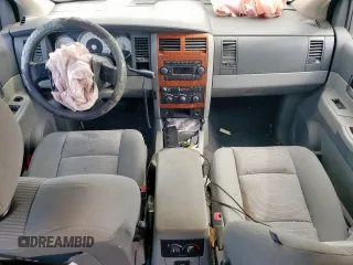 2007 Dodge Durango SLT z VIN 1D8HD48P87F581689, wystawiony jako Copart lot #54937005 z przebiegiem Nie podano mil oraz Szkoda całkowita • Salvage title. Historia ofert i sprzedaży dostępna na DreamBid. Obrazek 8.