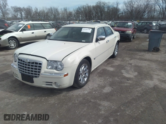 2005 Chrysler 300 with VIN 2C3JA63H65H144648, listed as a IAAI auction lot 41762730 with 125,757 mi miles. Bid and sale history available at carsss.com. Image 2.