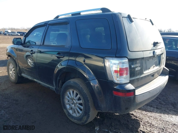 2011 Mercury Mariner Premier with VIN 4M2CN9HG1BKJ07239, listed as a IAAI auction lot 41487188 with 140,535 mi miles. Bid and sale history available at carsss.com. Image 3.