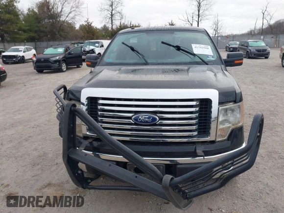 2011 Ford F-150 XL with VIN 1FTFW1EF4BFC28952, listed as a IAAI auction lot 41792908 with 122,460 mi miles. Bid and sale history available at carsss.com. Image 13.