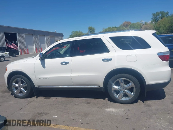 2012 Dodge Durango Citadel with VIN 1C4SDJET0CC100625, listed as a IAAI auction lot 42170821 with 130,866 mi miles and . Bid and sale history available at DreamBid. Image 14.