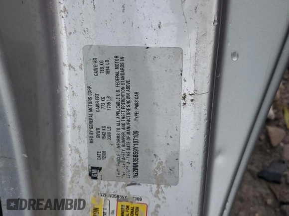 2009 Pontiac Solstice z VIN 1G2MN35B59Y107109, wystawiony jako Copart lot #76083734 z przebiegiem Nie podano mil oraz Nie do naprawy • Non repairable. Historia ofert i sprzedaży dostępna na DreamBid. Obrazek 13.