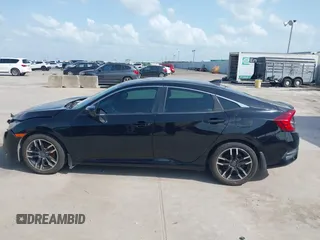 2016 Honda Civic EX-L with VIN 19XFC1F74GE039641, listed as a IAAI auction lot 42519321 with 139,765 mi miles and . Bid and sale history available at DreamBid. Image 14.