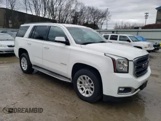 2015 GMC Yukon SLE with VIN 1GKS2AKC0FR107168, listed as a Copart auction lot 47882895 with 149,448 mi miles and Clean Title. Bid and sale history available at carsss.com. Image 4.