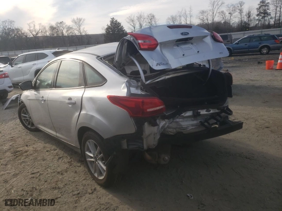 2017 Ford Focus SE with VIN 1FADP3F23HL327032, listed as a Copart auction lot 42398055 with 123,453 mi miles and Salvage Title. Bid and sale history available at carsss.com. Image 2.
