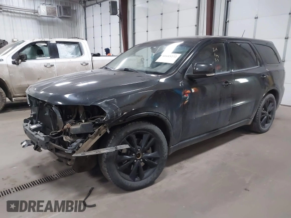 2013 Dodge Durango R/T z VIN 1C4SDJCT4DC670406, wystawiony jako IAAI lot #41685272 z przebiegiem 230 767 mil mil oraz . Historia ofert i sprzedaży dostępna na DreamBid. Obrazek 18.