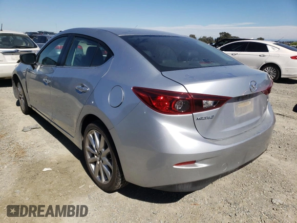 2017 Mazda 3 Touring z VIN 3MZBN1V79HM119726, wystawiony jako Copart lot #60819782 z przebiegiem 108 939 mil mil oraz Szkoda całkowita • Salvage title. Historia ofert i sprzedaży dostępna na DreamBid. Obrazek 3.