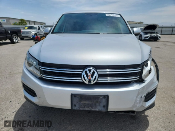 2014 Volkswagen Tiguan SE with VIN WVGAV3AX3EW590861, listed as a Copart auction lot 58517535 with 68,481 mi miles and Salvage title. Bid and sale history available at DreamBid. Image 5.