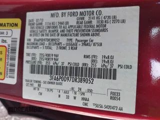 2013 Ford Fusion Titanium with VIN 3FA6P0D97DR389052, listed as a IAAI auction lot 41750337 with 169,204 mi miles. Bid and sale history available at carsss.com. Image 9.