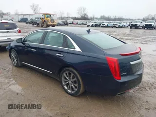 2013 Cadillac XTS Luxury with VIN 2G61P5S3XD9196239, listed as a IAAI auction lot 41205081 with 161,885 mi miles and . Bid and sale history available at carsss.com. Image 3.