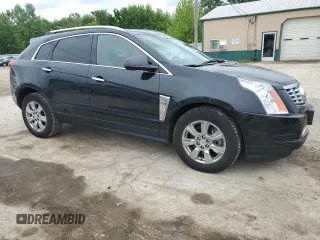 2014 Cadillac SRX Luxury Collection z VIN 3GYFNEE33ES639155, wystawiony jako Copart lot #58591935 z przebiegiem 76 368 mil mil oraz Szkoda całkowita • Salvage title. Historia ofert i sprzedaży dostępna na DreamBid. Obrazek 4.