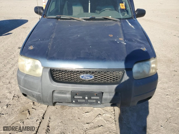 2001 Ford Escape XLT with VIN 1FMYU03171KB12159, listed as a Copart auction lot 87974165 with 0 mi miles and Salvage Title. Bid and sale history available at carsss.com. Image 12.