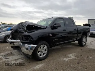 2014 Ram 2500 Tradesman with VIN 3C6UR5CL2EG106776, listed as a Copart auction lot 54512665 with 124,887 mi miles and Salvage title. Bid and sale history available at DreamBid. Image 1.