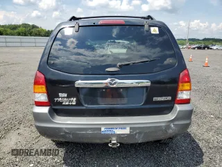 2002 Mazda Tribute LX with VIN 4F2CU09182KM28600, listed as a Copart auction lot 62314004 with 108,048 mi miles and Salvage Title. Bid and sale history available at carsss.com. Image 6.