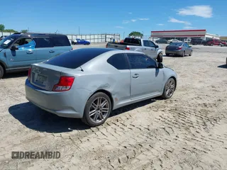 2012 Scion tC z VIN JTKJF5C70C3038591, wystawiony jako IAAI lot #42337910 z przebiegiem 191 646 mil mil oraz . Historia ofert i sprzedaży dostępna na DreamBid. Obrazek 4.