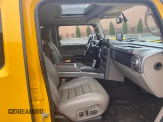 2003 Hummer H2 with VIN 5GRGN23UX3H112710, listed as a Copart auction lot 53854185 with 64,686 mi miles and Salvage Title. Bid and sale history available at carsss.com. Image 5.