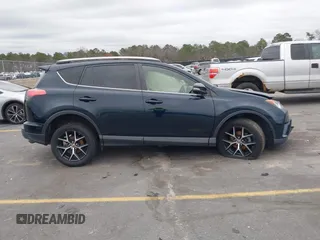 2017 Toyota RAV4 SE with VIN JTMJFREV0HD200683, listed as a IAAI auction lot 41595927 with 109,981 mi miles and . Bid and sale history available at DreamBid. Image 13.