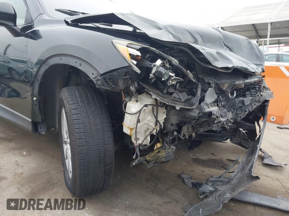 2014 Mazda CX-5 Touring z VIN JM3KE2CY3E0355332, wystawiony jako IAAI lot #42096306 z przebiegiem 108 198 mil mil oraz . Historia ofert i sprzedaży dostępna na DreamBid. Obrazek 18.