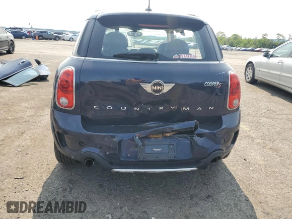2015 MINI Countryman S z VIN WMWZC5C54FWP48739, wystawiony jako Copart lot #58197575 z przebiegiem 119 816 mil mil oraz Szkoda całkowita • Salvage title. Historia ofert i sprzedaży dostępna na DreamBid. Obrazek 6.