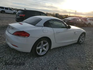 2012 BMW Z4 sDrive28i with VIN WBALL5C59CJ103051, listed as a Copart auction lot 87015834 with 92,071 mi miles and Salvage title. Bid and sale history available at DreamBid. Image 3.