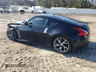 2016 Nissan 370Z with VIN JN1AZ4EH6GM934024, listed as a Copart auction lot 43826185 with 158,973 mi miles and Salvage Title. Bid and sale history available at carsss.com. Image 2.