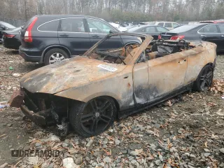 2011 BMW 1 Series 135i with VIN WBAUN7C52BVM23944, listed as a Copart auction lot 84061924 with Not Provided miles and Salvage Title. Bid and sale history available at DreamBid. Image 1.