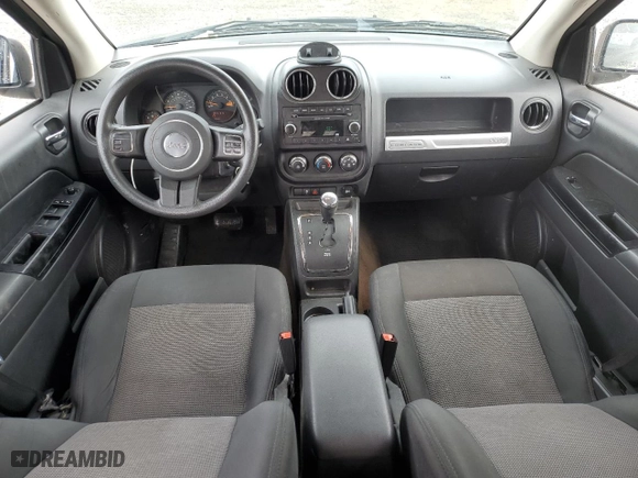 2014 Jeep Compass Sport with VIN 1C4NJCBA2ED708048, listed as a Copart auction lot 51190065 with 120,490 mi miles and Salvage Title. Bid and sale history available at carsss.com. Image 8.