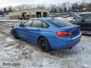 2015 BMW 4 Series 428i xDrive with VIN WBA4C9C50FD330529, listed as a Copart auction lot 87811935 with 111,899 mi miles and Salvage Title. Bid and sale history available at carsss.com. Image 2.