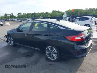 2021 Honda Clarity Touring z VIN JHMZC5F3XMC001253, wystawiony jako IAAI lot #42212102 z przebiegiem 35 649 mil mil oraz . Historia ofert i sprzedaży dostępna na DreamBid. Obrazek 3.
