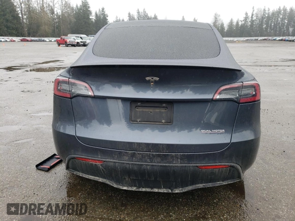 2022 Tesla Model Y Performance with VIN 7SAYGDEF2NF459268, listed as a Copart auction lot 45764735 with 64,421 mi miles and Salvage title. Bid and sale history available at DreamBid. Image 6.