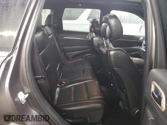 2015 Jeep Grand Cherokee Overland with VIN 1C4RJFCT2FC613502, listed as a Copart auction lot 89207005 with 124,482 mi miles and Salvage Title. Bid and sale history available at carsss.com. Image 10.