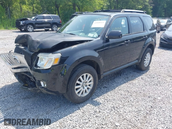 2011 Mercury Mariner Premier with VIN 4M2CN9HG4BKJ00186, listed as a IAAI auction lot 42840165 with 149,700 mi miles and . Bid and sale history available at DreamBid. Image 2.