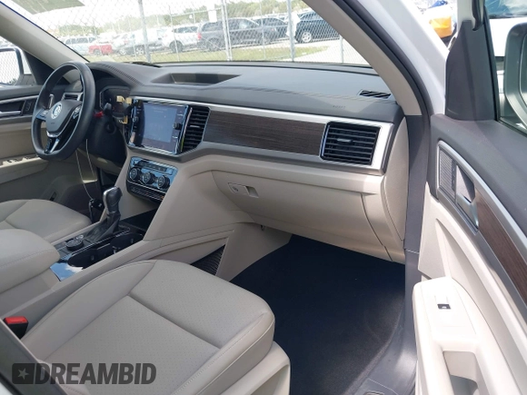 2019 Volkswagen Atlas SEL with VIN 1V2MR2CA7KC557754, listed as a IAAI auction lot 42264080 with 20,412 mi miles and . Bid and sale history available at DreamBid. Image 5.