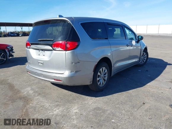 2017 Chrysler Pacifica Touring with VIN 2C4RC1DG1HR519085, listed as a IAAI auction lot 41053786 with 269,605 mi miles and . Bid and sale history available at DreamBid. Image 4.